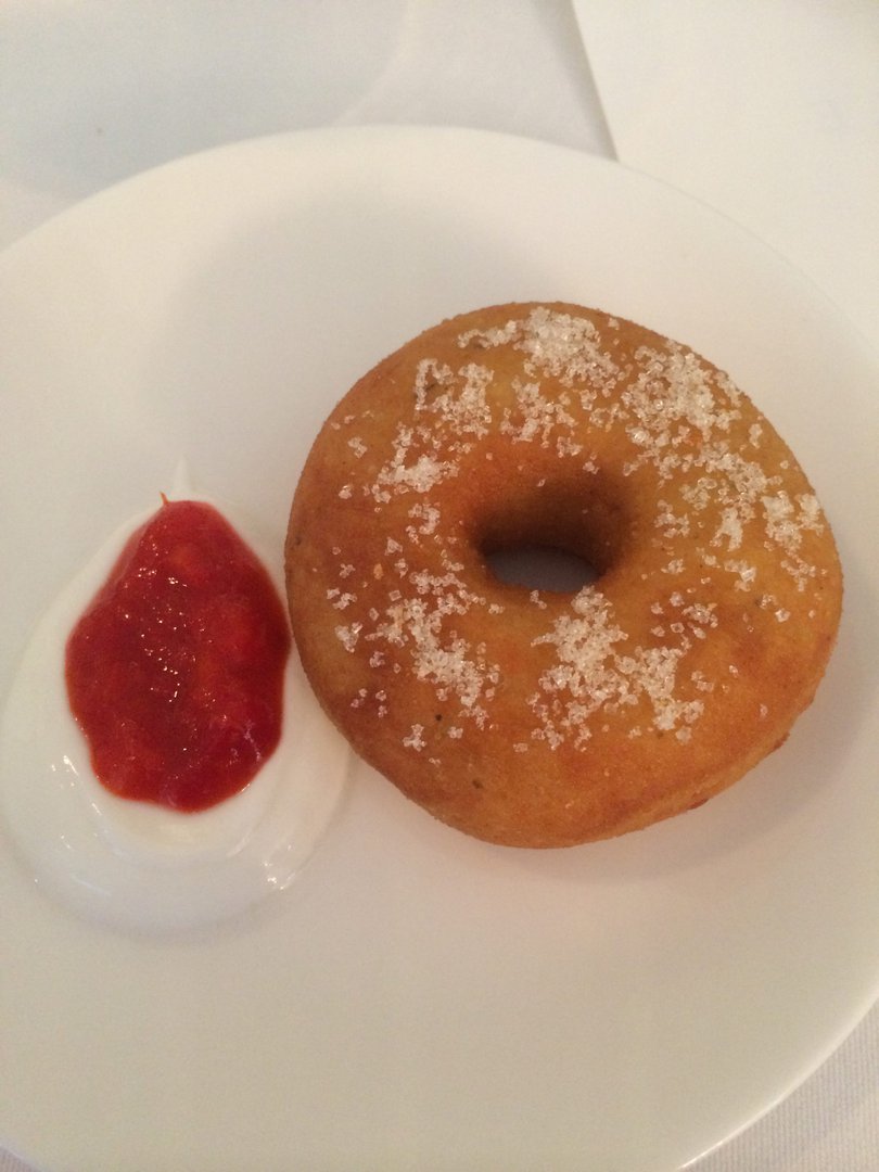 Chickpea doughnut with paprika jam and sour cream